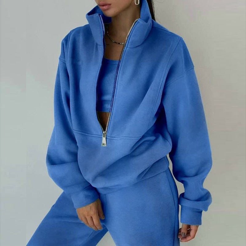 Women's casualwear set by Plush Fashion Hub featuring a zip neck long sleeve sweatshirt and slim fit pants.