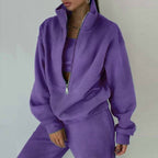 Women's casualwear set by Plush Fashion Hub featuring a zip neck long sleeve sweatshirt and slim fit pants.