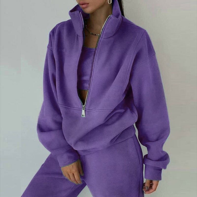 Women's casualwear set by Plush Fashion Hub featuring a zip neck long sleeve sweatshirt and slim fit pants.