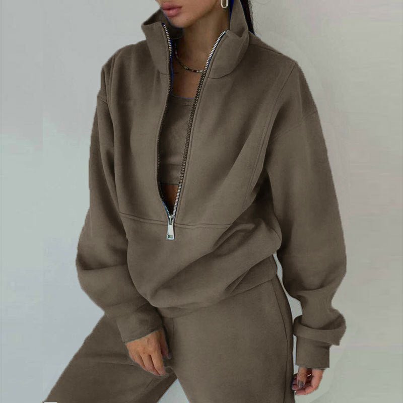 Women's 2-piece zip neck long sleeve sweatshirt and slim fit pants set by Plush Fashion Hub, casualwear outfit, front view.