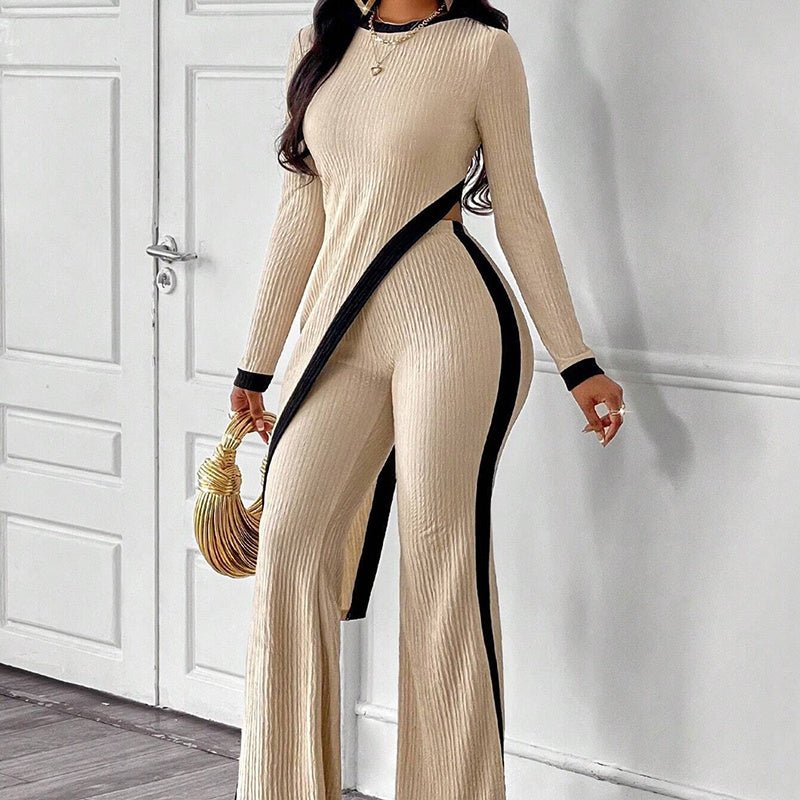 Women’s casualwear set featuring an asymmetrical top and matching pants by Plush Fashion Hub, shown in a stylish, relaxed fit.
