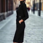Women’s black bodycon midi dress by Plush Fashion Hub, casualwear style, fitted silhouette, knee-length, with a sleeveless design.