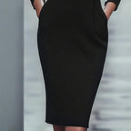 Women’s black bodycon midi dress by Plush Fashion Hub, showcasing a fitted casualwear dress with a sleek, elegant silhouette.