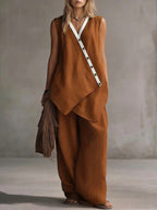 Women's boho V-neck button vest and wide-leg pants set from Plush Fashion Hub, casualwear with relaxed fit and stylish design.