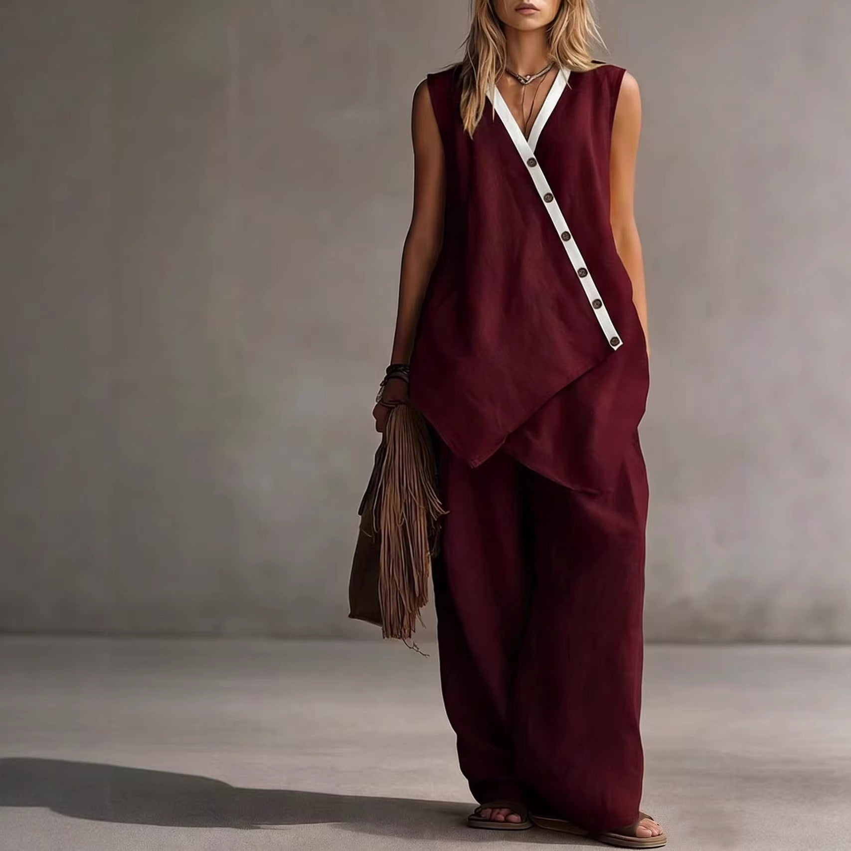 Women's boho V-neck button vest and wide-leg pants set by Plush Fashion Hub, casualwear with relaxed fit and stylish design.
