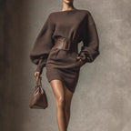 Women’s brown bodycon mini dress with boat neck and long sleeves, casualwear from Plush Fashion Hub.