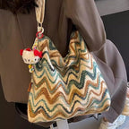 Women’s casual ethnic-style embroidered crossbody shoulder bag with colorful patterns and a comfortable strap, by Plush Fashion Hub