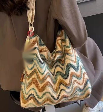 Embroidered ethnic-style women's crossbody shoulder bag with casual design and detailed embroidery from Plush Fashion Hub.