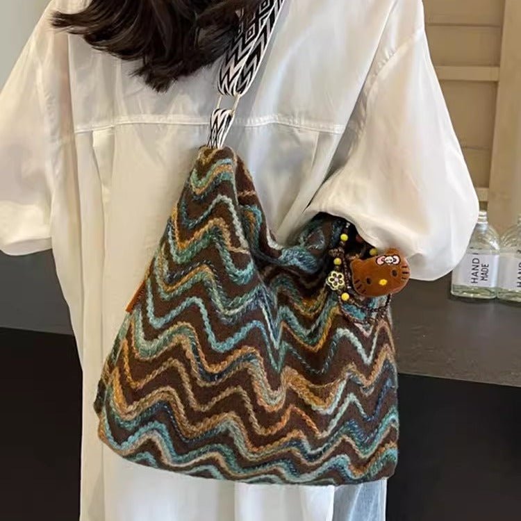 Women’s casual ethnic-style embroidered crossbody shoulder bag with colorful threadwork and traditional design, made by Plush Fashion Hub.