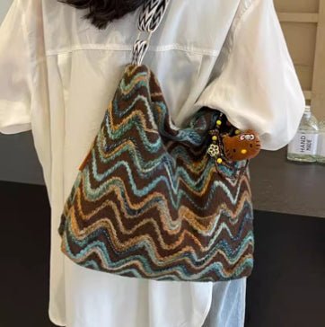 Embroidered ethnic-style women's casual crossbody shoulder bag with colorful patterns and adjustable strap by Plush Fashion Hub.