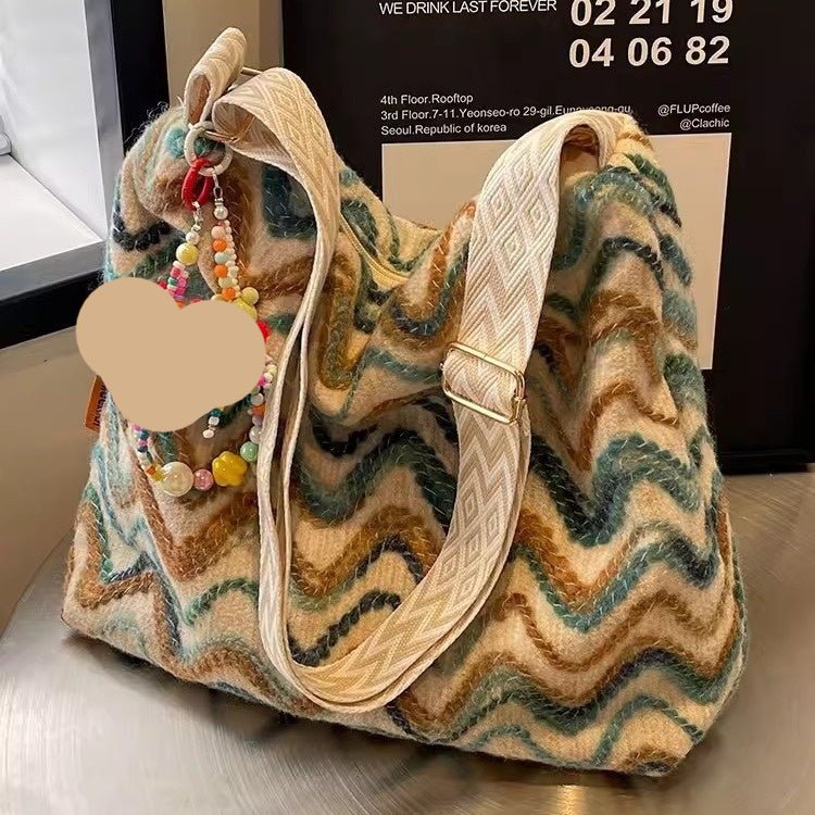 Embroidered ethnic-style women's crossbody shoulder bag with casual design and colorful thread details by Plush Fashion Hub.