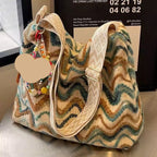 Embroidered ethnic-style women's crossbody shoulder bag with casual design and colorful thread details by Plush Fashion Hub.