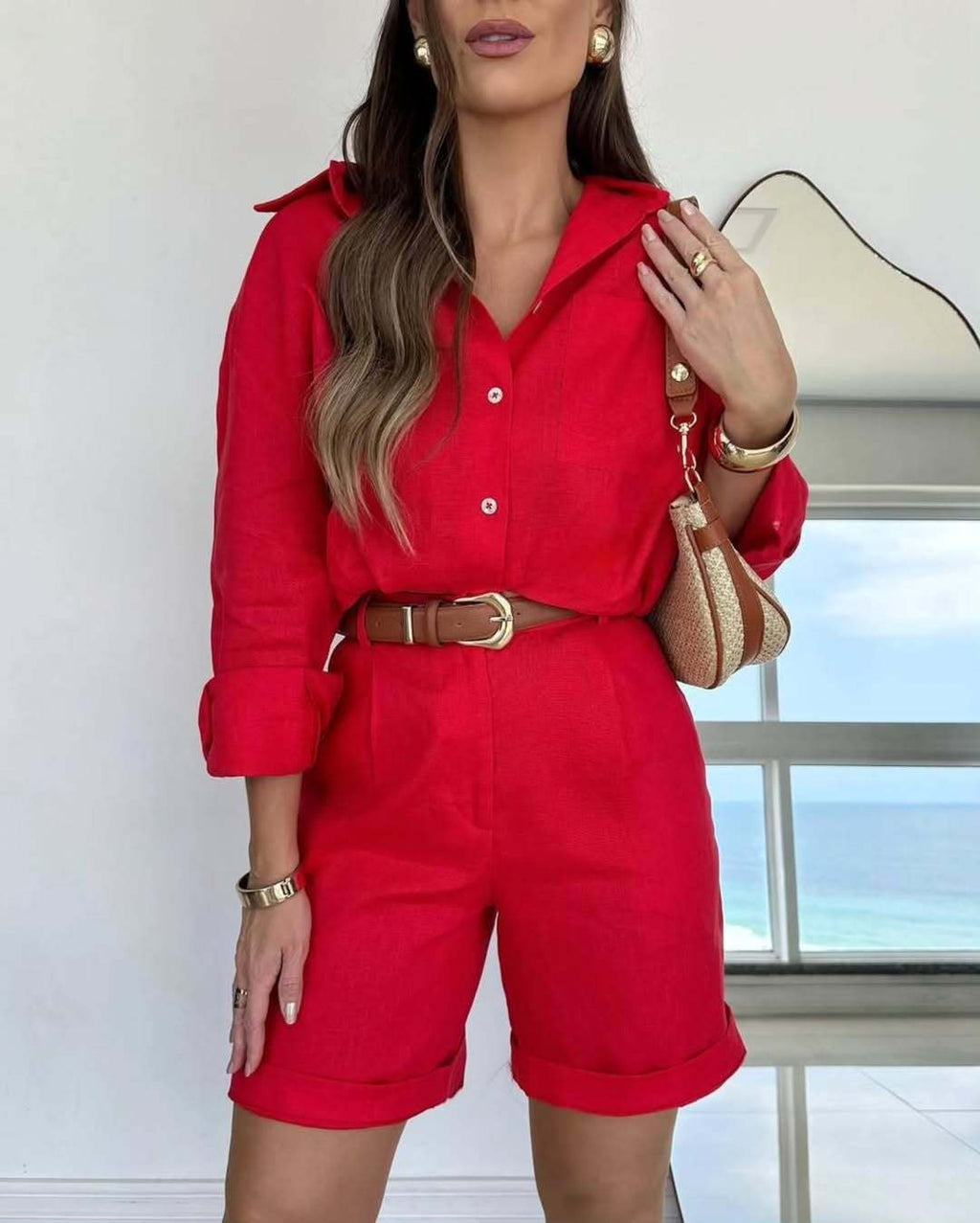 Women's casual long-sleeve cotton shirt and shorts set by Plush Fashion Hub, displayed on a model for comfortable everyday wear.