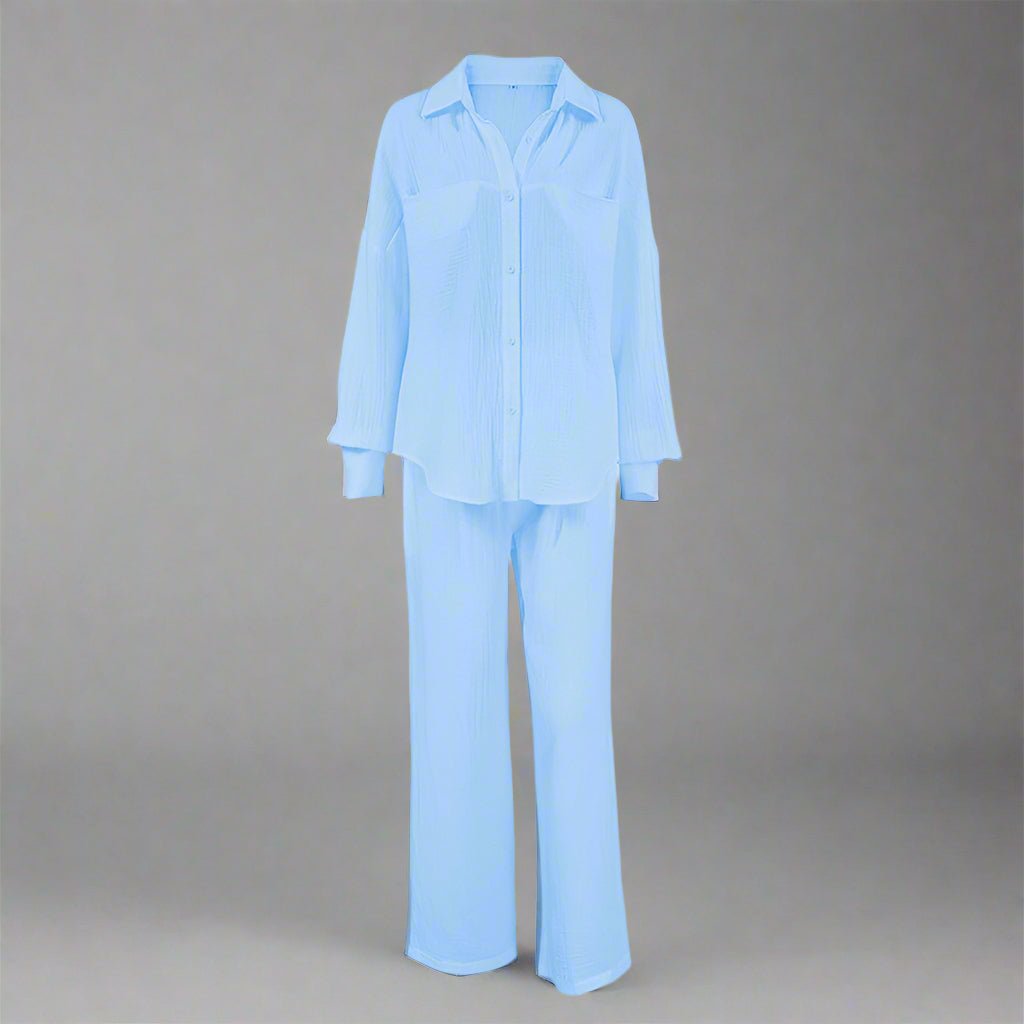 Women’s casual solid color lounge set in soft fabric, featuring relaxed fit top and pants, by Plush Fashion Hub.