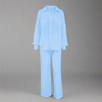 Women’s casual solid color lounge set in soft fabric, featuring relaxed fit top and pants, by Plush Fashion Hub.