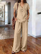 Women’s casual solid color two-piece set by Plush Fashion Hub, featuring a relaxed top and matching pants, perfect for everyday wear.