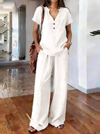 Women’s casual solid color two-piece set by Plush Fashion Hub featuring a relaxed fit top and matching pants, perfect for everyday wear.