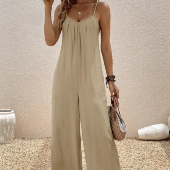 Women’s sleeveless V-neck casual suspender jumpsuit in solid color, stylish one-piece from Plush Fashion Hub.