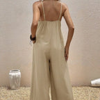 Women’s sleeveless casual suspender jumpsuit with V-neck, solid color, one-piece design by Plush Fashion Hub.