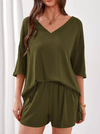 Women's casual V-neck top and shorts set in solid color, trendy two-piece clothing set for relaxed style and comfort.