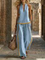 Women’s contrast color sleeveless vest and wide-leg pants set, casualwear by Plush Fashion Hub, displayed on a model.