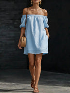 Women's cotton-linen off-shoulder puff-sleeve loose mini dress, casualwear by Plush Fashion Hub, shown on a model.