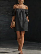 Women's cotton-linen off-shoulder puff-sleeve loose mini dress from Plush Fashion Hub, shown on a model with a relaxed fit and casual style.