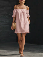 Women’s cotton-linen off-shoulder puff-sleeve loose mini dress, casualwear by Plush Fashion Hub, shown on a model.