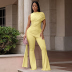 Women’s casual jumpsuit with a crew neck, pleated ribbon details, and flare legs from Plush Fashion Hub.