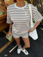 Women's casual spliced crew-neck T-shirt and shorts set by Plush Fashion Hub, featuring short sleeves and comfortable fit.