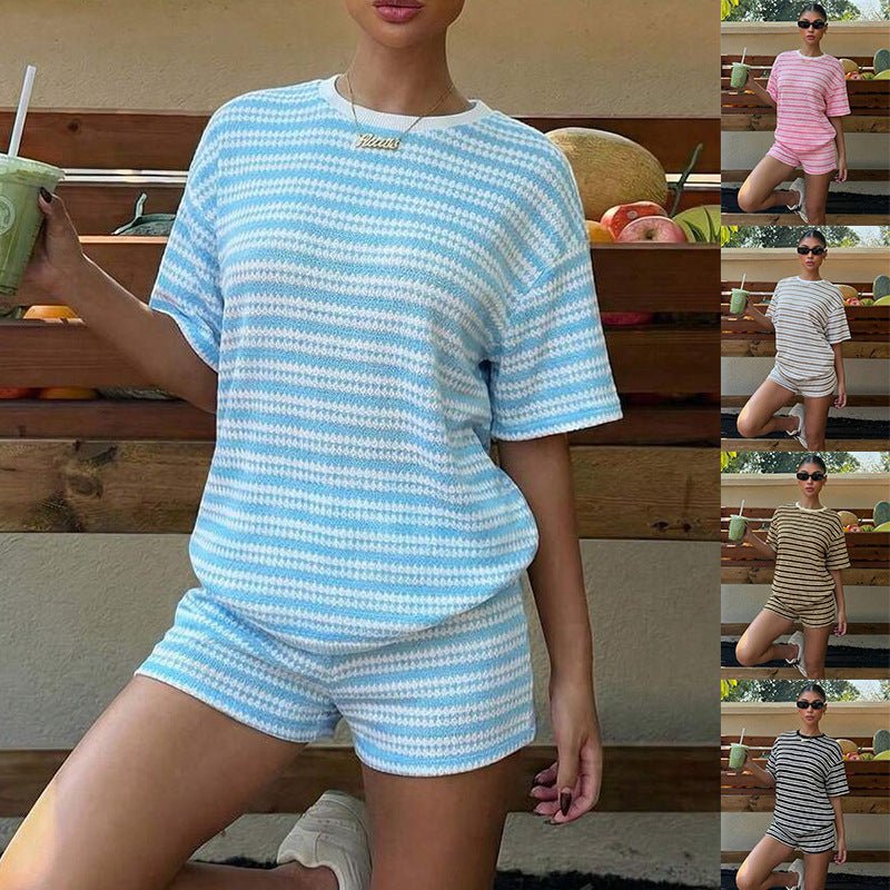 Women's casualwear set featuring a spliced crew-neck short-sleeve T-shirt and matching shorts by Plush Fashion Hub.