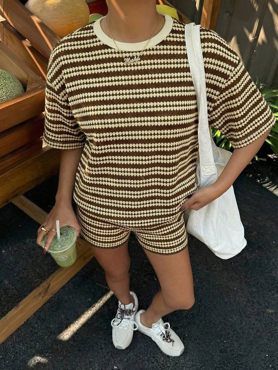 Women's crew-neck spliced short-sleeve T-shirt and shorts set by Plush Fashion Hub, casualwear with stylish color blocking.