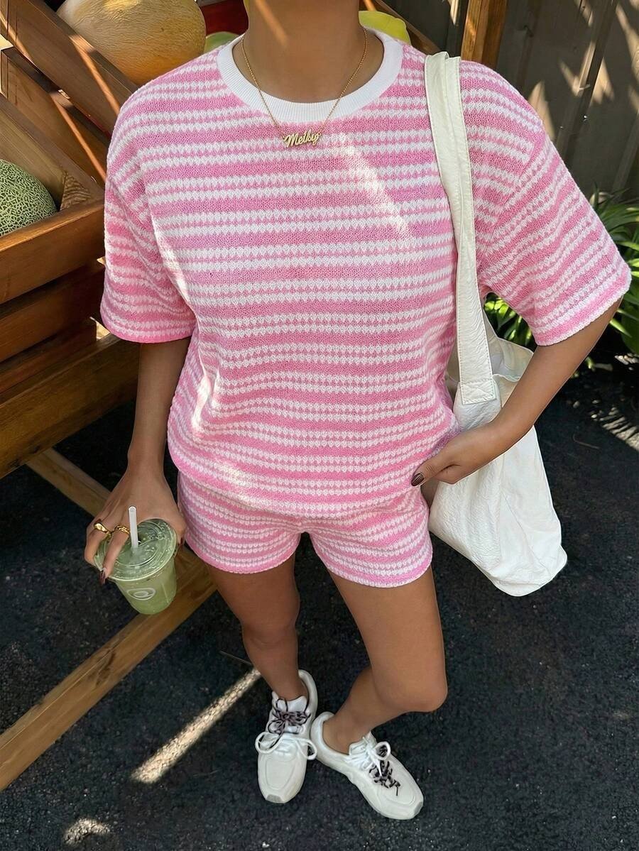 Women's casual crew-neck spliced T-shirt and shorts set by Plush Fashion Hub, featuring short sleeves and a relaxed fit.
