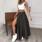Women’s cropped vest and high-waisted slit skirt matching set by Plush Fashion Hub, casualwear ensemble with stylish, coordinated pieces.