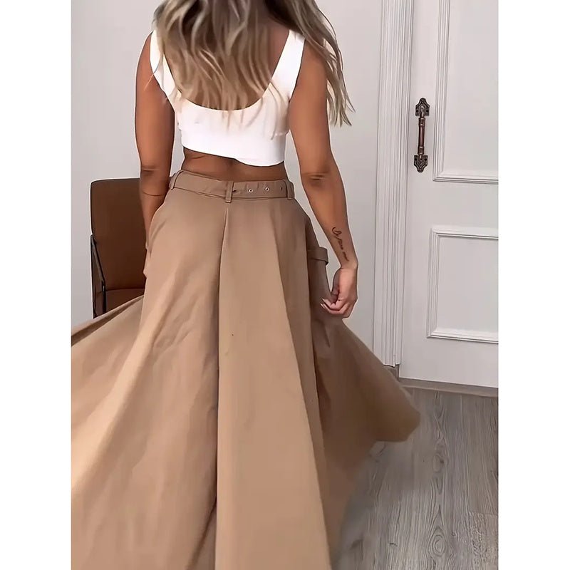 Women's cropped vest and high-waisted slit skirt matching casualwear set by Plush Fashion Hub, displayed on a model.