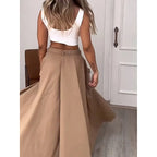Women's cropped vest and high-waisted slit skirt matching casualwear set by Plush Fashion Hub, displayed on a model.