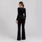 Women’s diamond-encrusted square-collar flared jumpsuit from Plush Fashion Hub, showcased with a fitted waist and wide-leg design.