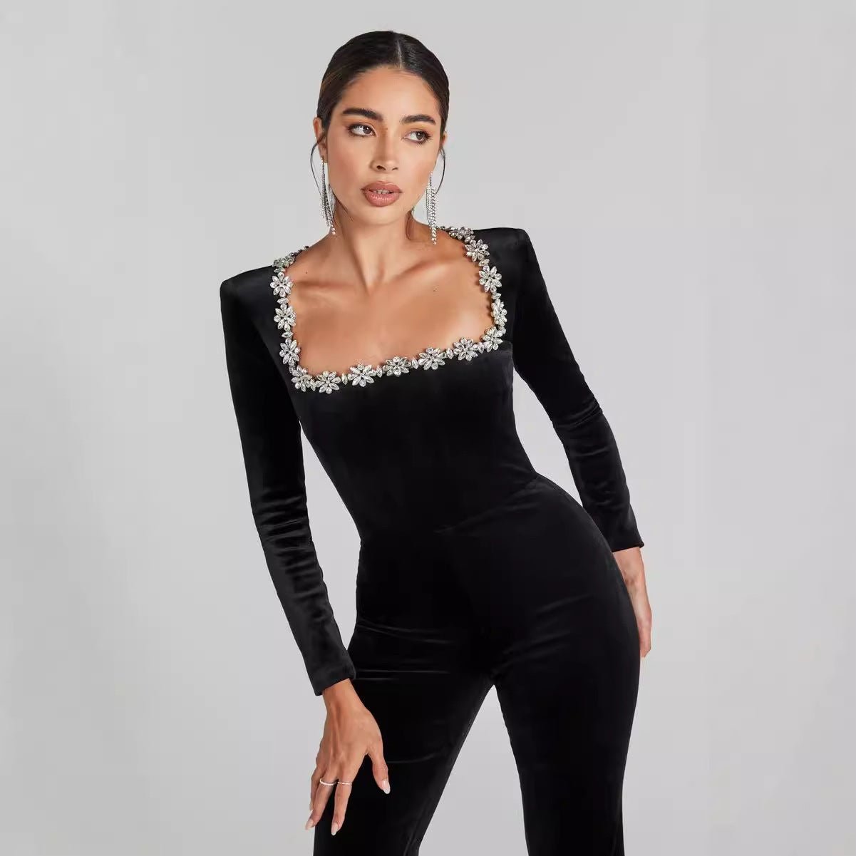 Women’s diamond-encrusted square-collar flared jumpsuit by Plush Fashion Hub, featuring a stylish casualwear design with sparkling details.