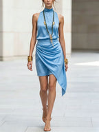 Women's double-layer asymmetrical hem mini skirt in casualwear style by Plush Fashion Hub, showcasing its unique layered design.