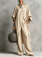 Women's casual drop shoulder three-quarter sleeve irregular shirt and pants set by Plush Fashion Hub, styled for relaxed wear.