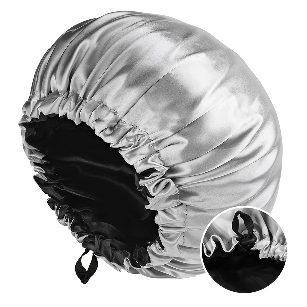 Soft silk women's sleep bonnet with double layers, buttons, and adjustable fit for comfortable nightly wear and hair protection.