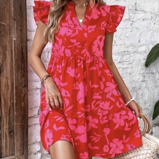 Women’s floral A-line vacation dress by Plush Fashion Hub, featuring a casual, flowy design with vibrant floral patterns.