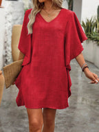 Women's flowy V-neck casual mini dress with ruffled sleeves, stylish and comfortable for everyday wear.