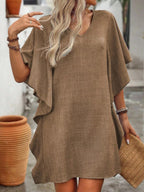 Women's flowy V-neck casual mini dress with ruffled sleeves, stylish and comfortable, from Trendsi.