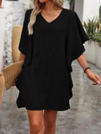 Women's flowy V-neck casual mini dress with ruffled sleeves, stylish and comfortable, by Trendsi.