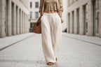 Women's sleeveless cardigan top and long pants set by Plush Fashion Hub, casualwear with front buttons and relaxed fit.