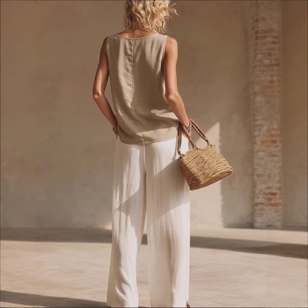 Women's sleeveless button-front cardigan and long pants set in casualwear style by Plush Fashion Hub.