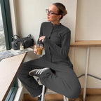 Women's ribbed knit cardigan and button-front trousers set by Plush Fashion Hub, featuring a half-high-neck and casual style.