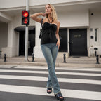 Women's halterneck backless sleeveless casual top by Plush Fashion Hub, shown in a stylish front view.