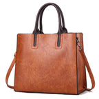 Women’s handbag by Plush Fashion Hub featuring a sleek design, top handles, and stylish details for everyday use.